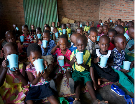 Children having porridge